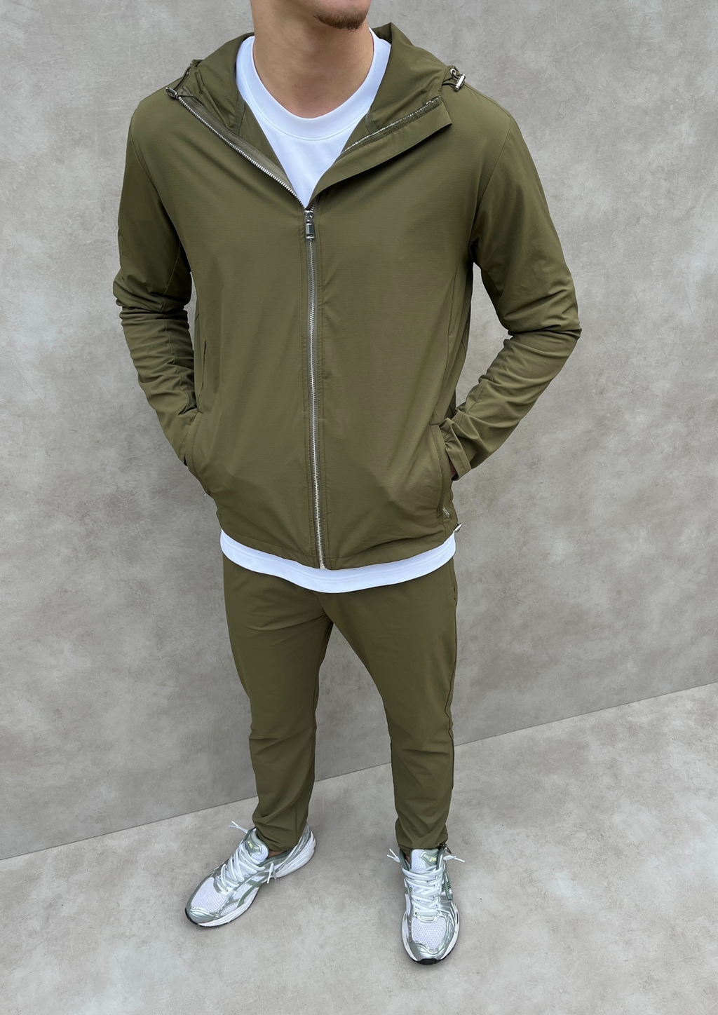 The Phantom Tech Windbreaker in Olive