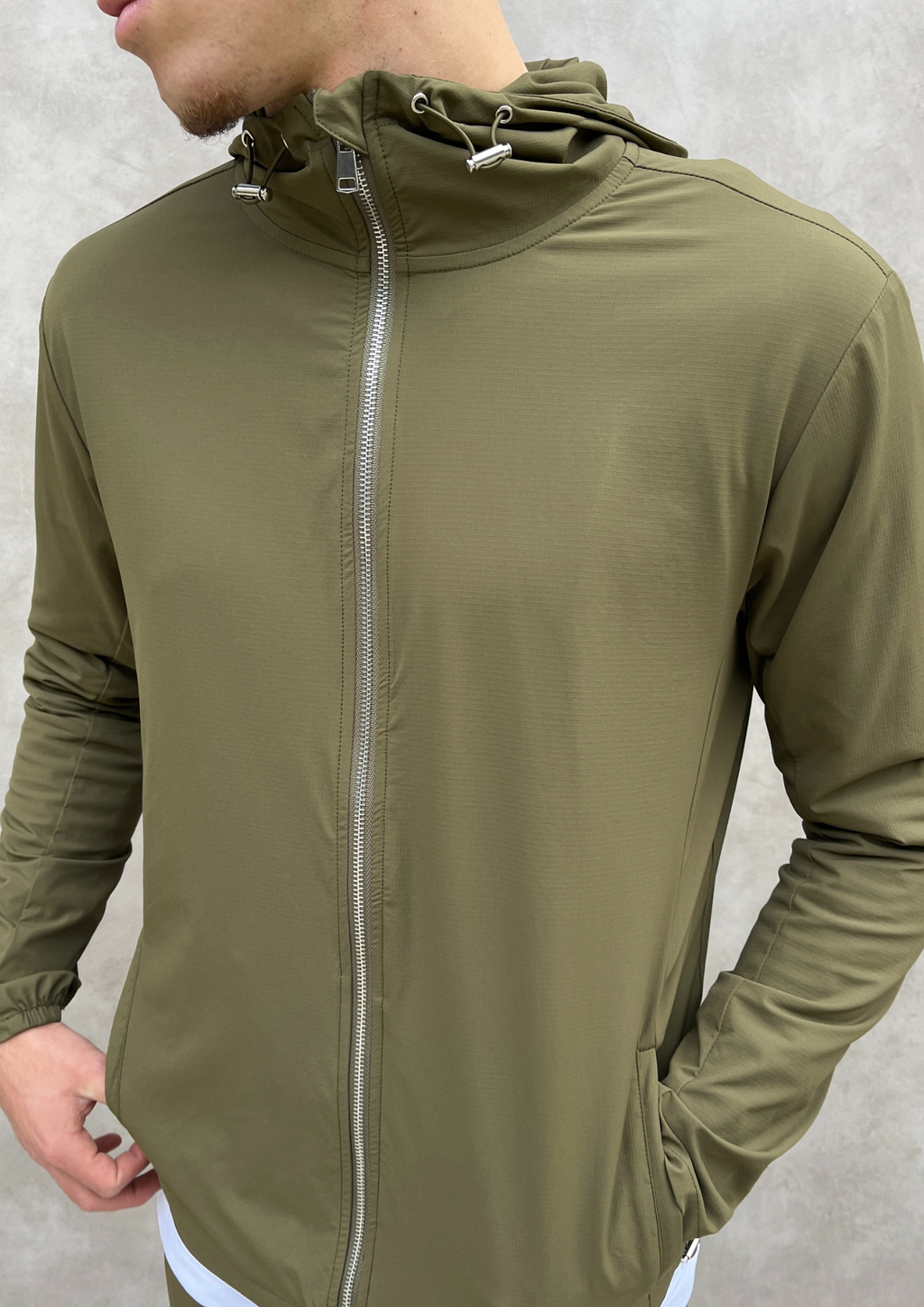 The Phantom Tech Windbreaker in Olive